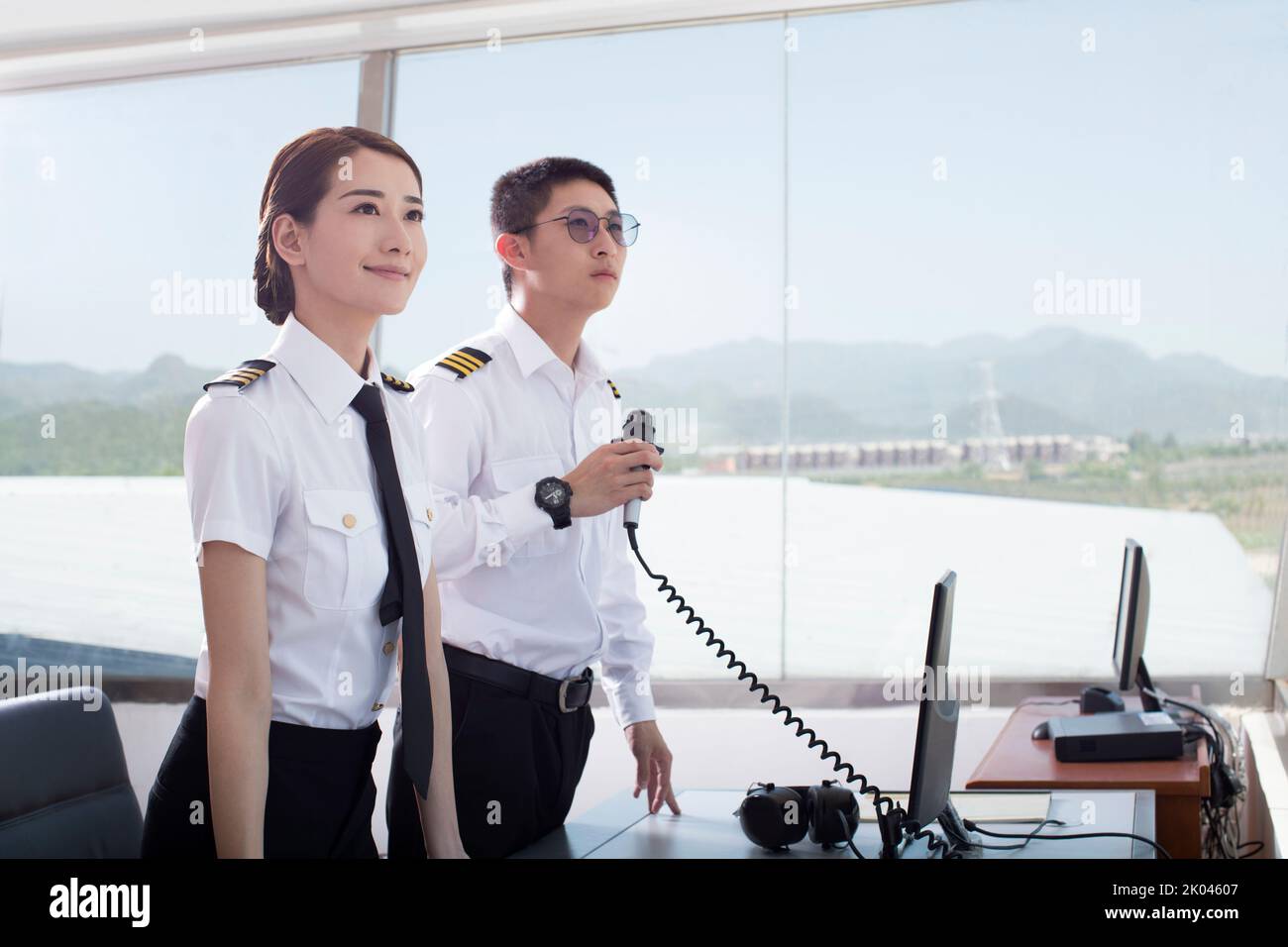 Chinese air traffic controllers in tower Stock Photo