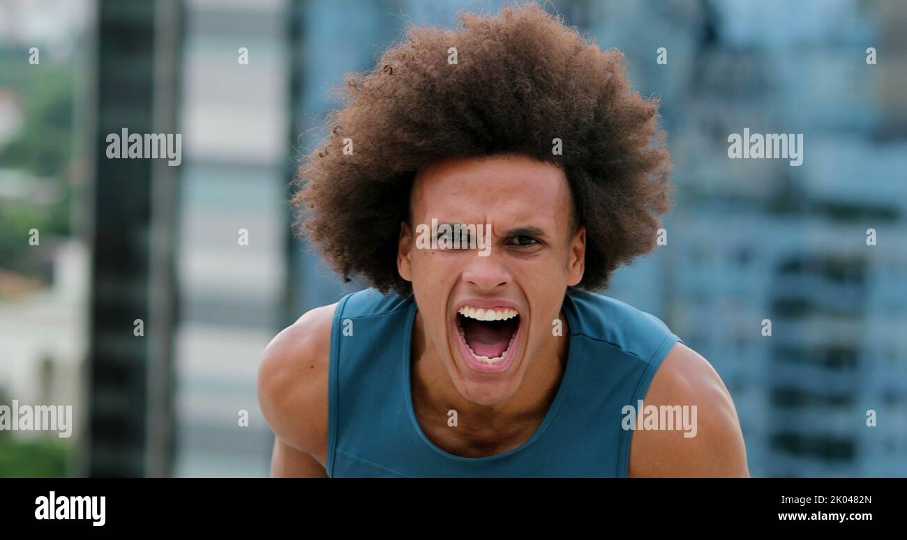 Young man screaming top lungs hi-res stock photography and images - Alamy