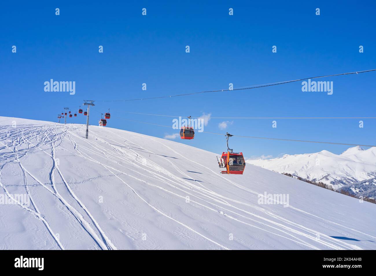 Cableway in the snowy mountains of Arkhyz resort city in Russia. Stock Photo