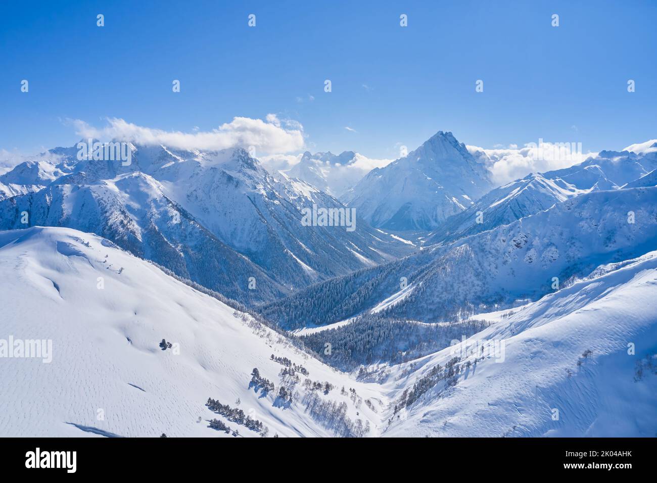 Aerial view of snowy mountains hi-res stock photography and images - Alamy