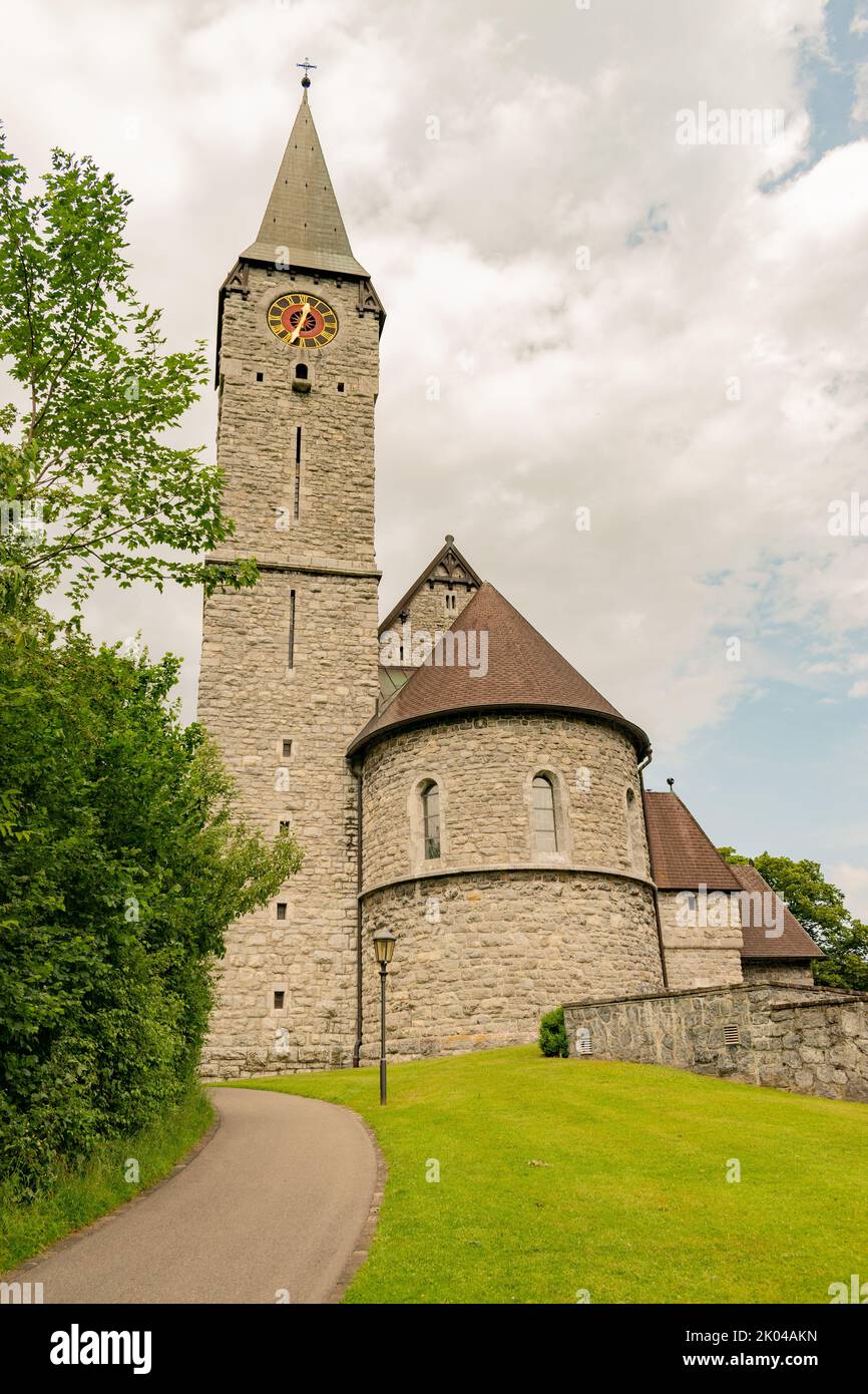 Balzers, Liechtenstein, June 5, 2022 Historic old church saint Nikolaus on a cloudy day Stock Photo