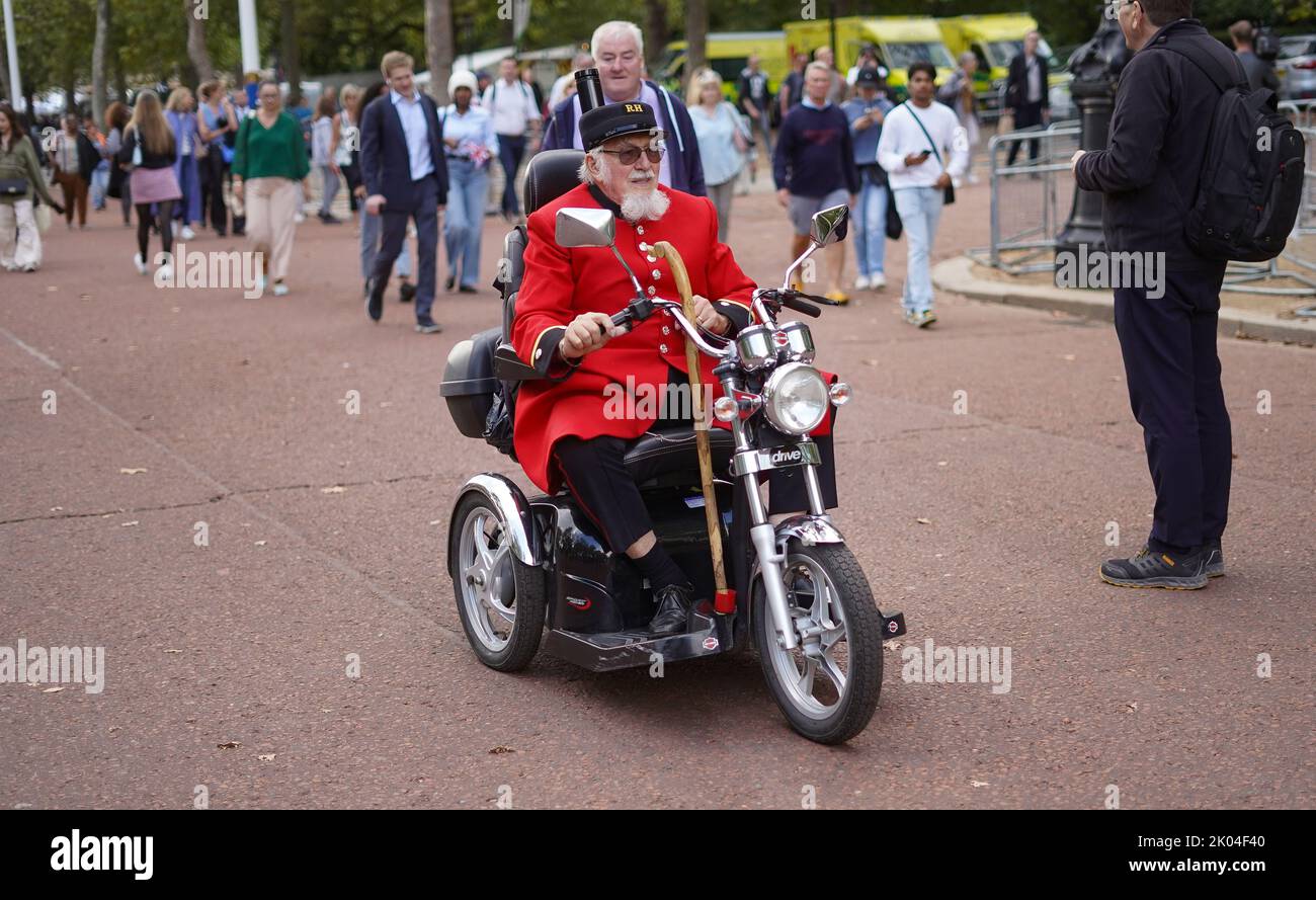 © Jeff Moore A Chelsea Pensioner on his mobility scooter on the Mall
