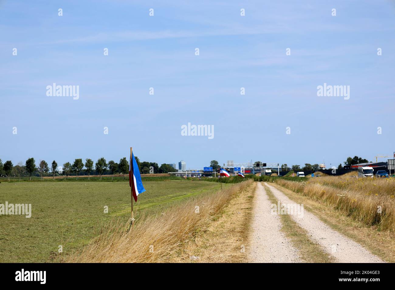 Flag upside down as farmers protest against government measures for nitrogen deposition in Wezep, Netherlands Stock Photo