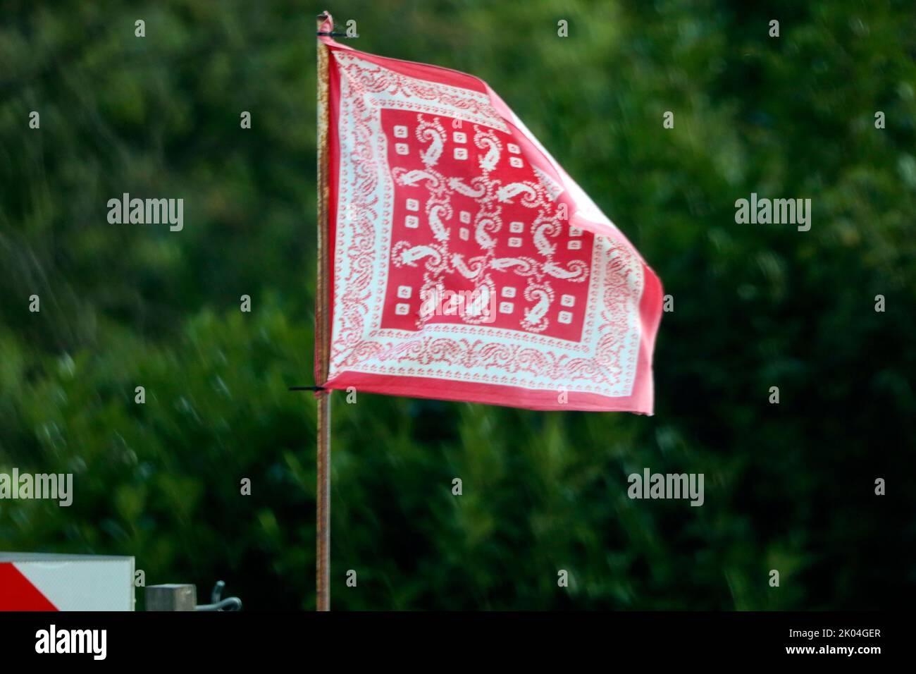 Red farmer's handkerchief as a farmer's protest against government