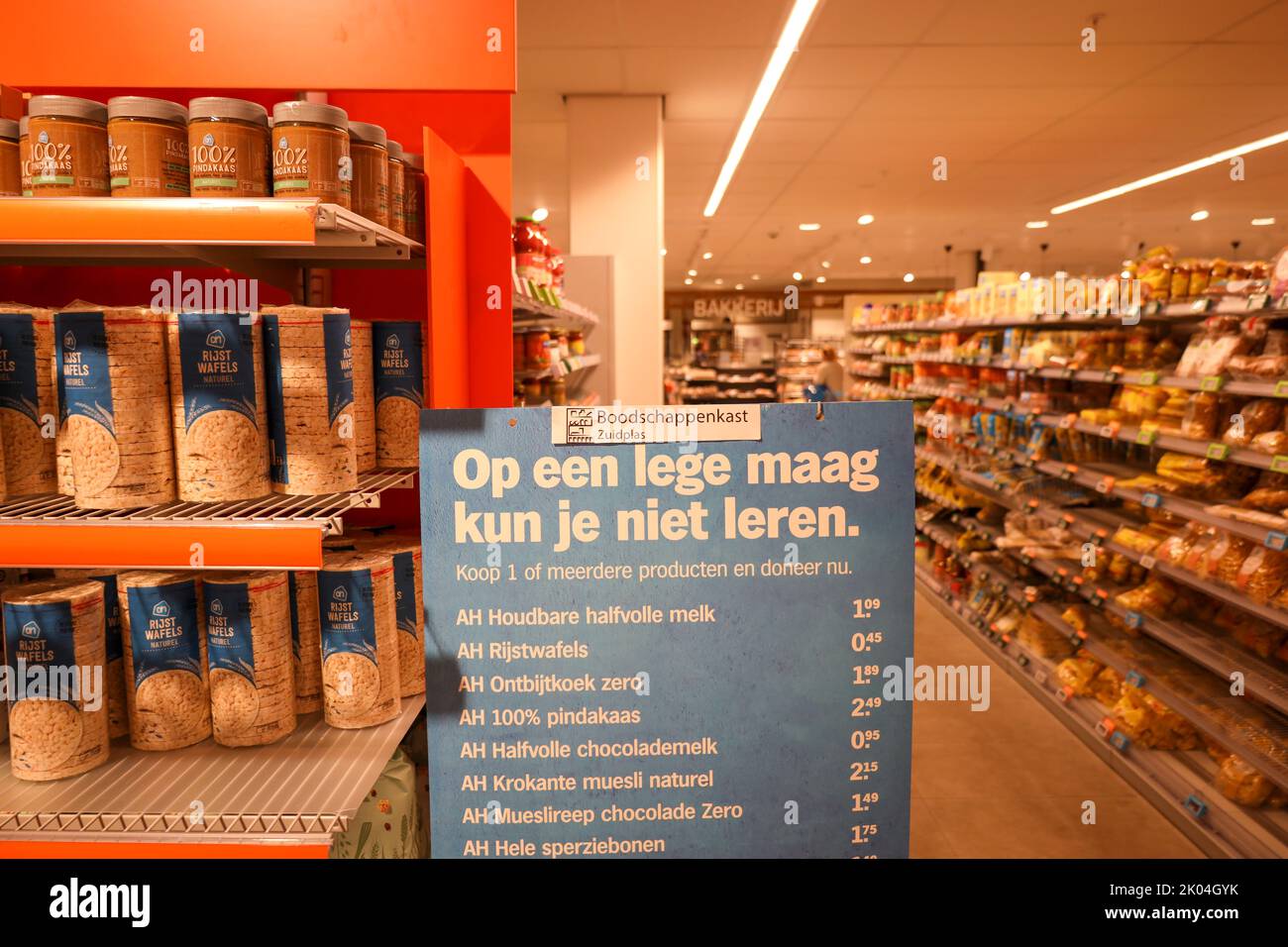 Supermarket Albert Heijn is raising food for the Boodschappenkast in Nieuwerkerk aan den IJssel for people with poverty in the Netherlands Stock Photo
