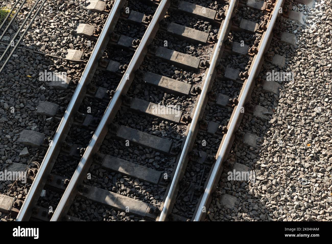 Modern railway with concrete slippers, top view. Transportation photo background Stock Photo