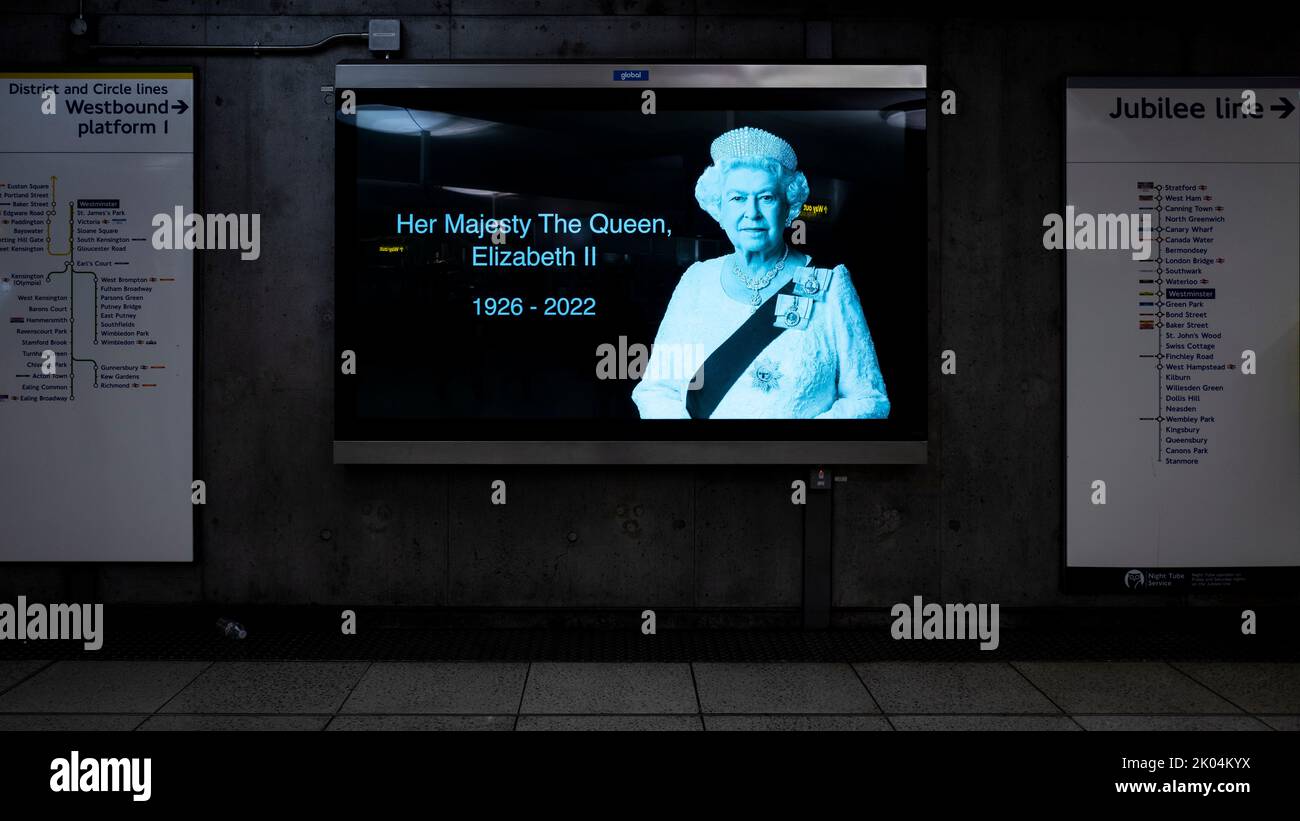 London, UK.  9 September 2022.  A digital screen at Westminster tube station honours the Queen.  The day before, it was announced that Queen Elizabeth II, the longest-reigning monarch in British history, had died at the age of 96 in Balmoral, Scotland.  Her son, to be now known as King Charles III, will succeed her.  Credit: Stephen Chung / Alamy Live News Stock Photo