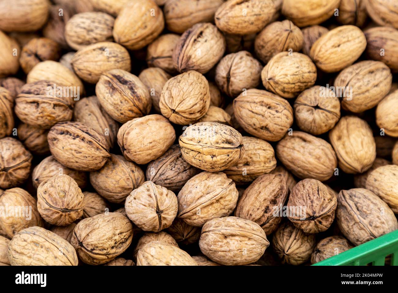 Walnuts in shells at the food market in Bärenplatz and Bundesplatz, Bern, Switzerland Stock Photo