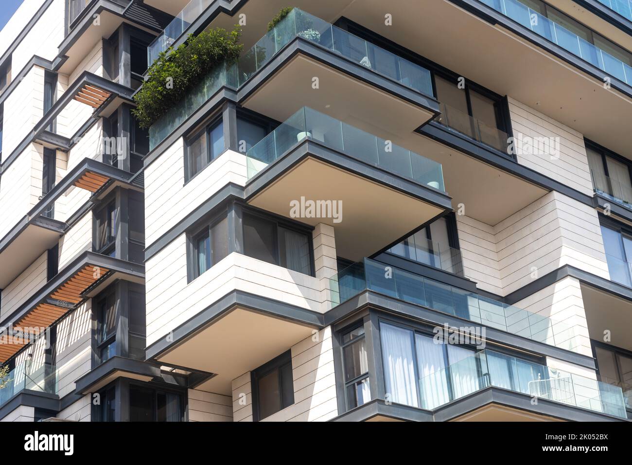 View on balconies of modern apartments exterior at daylight Stock Photo