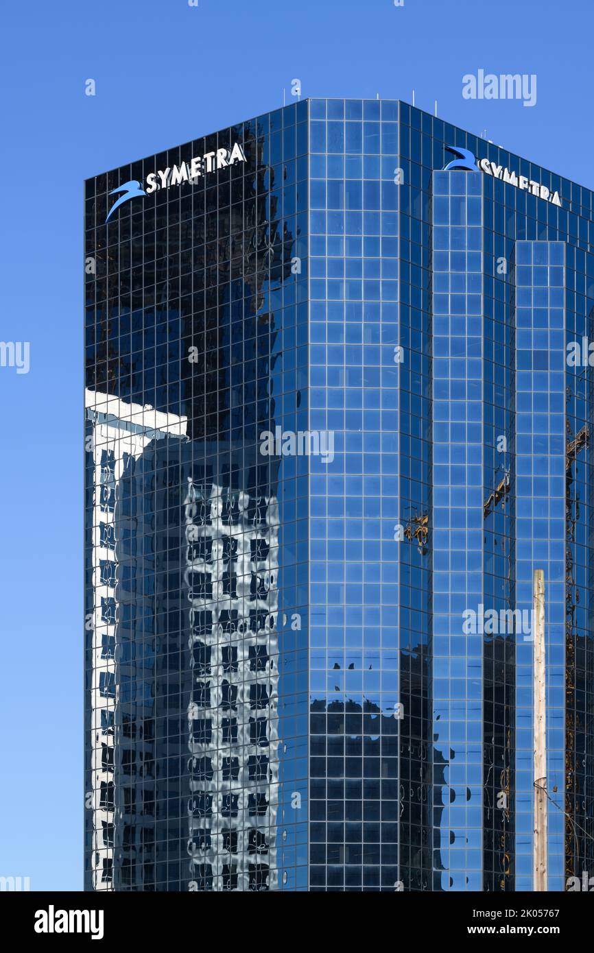 Bellevue, WA, USA - September 08, 2022; Blue Symetra office tower in Bellevue Washington reflecting a nearby building Stock Photo