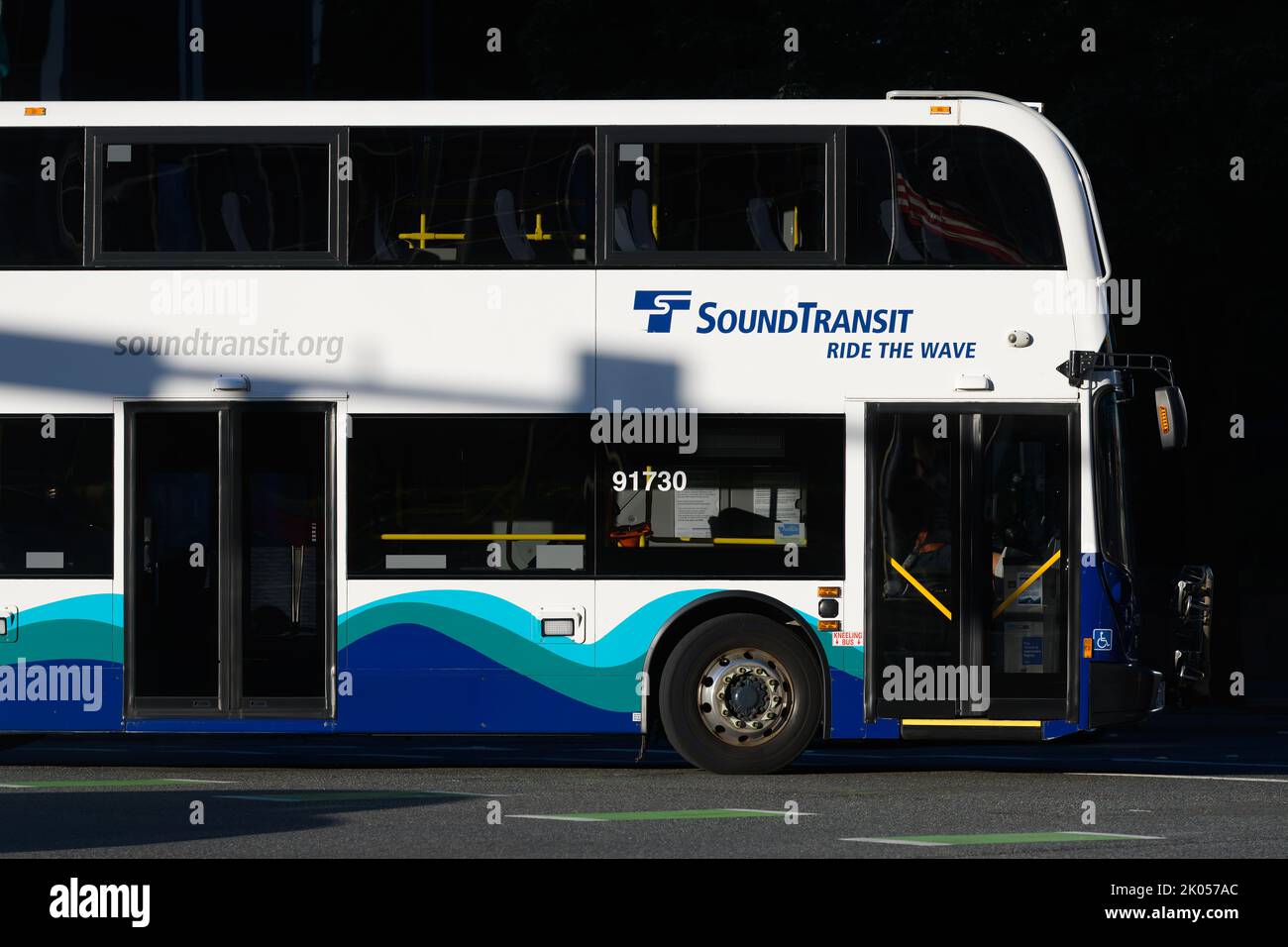 Bellevue, WA, USA - September 08, 2022; Sound Transit Ride the Wave double decker bus in profile in high contrast Stock Photo