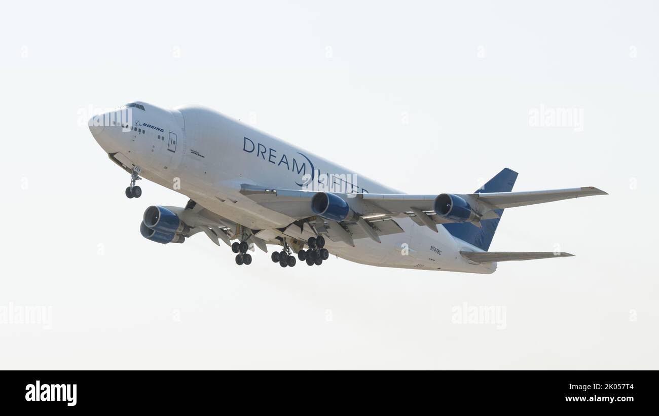 Everett, WA, USA - September 02, 2022; Boeing Dreamlifter aircraft isolated on takeoff against white sky Stock Photo