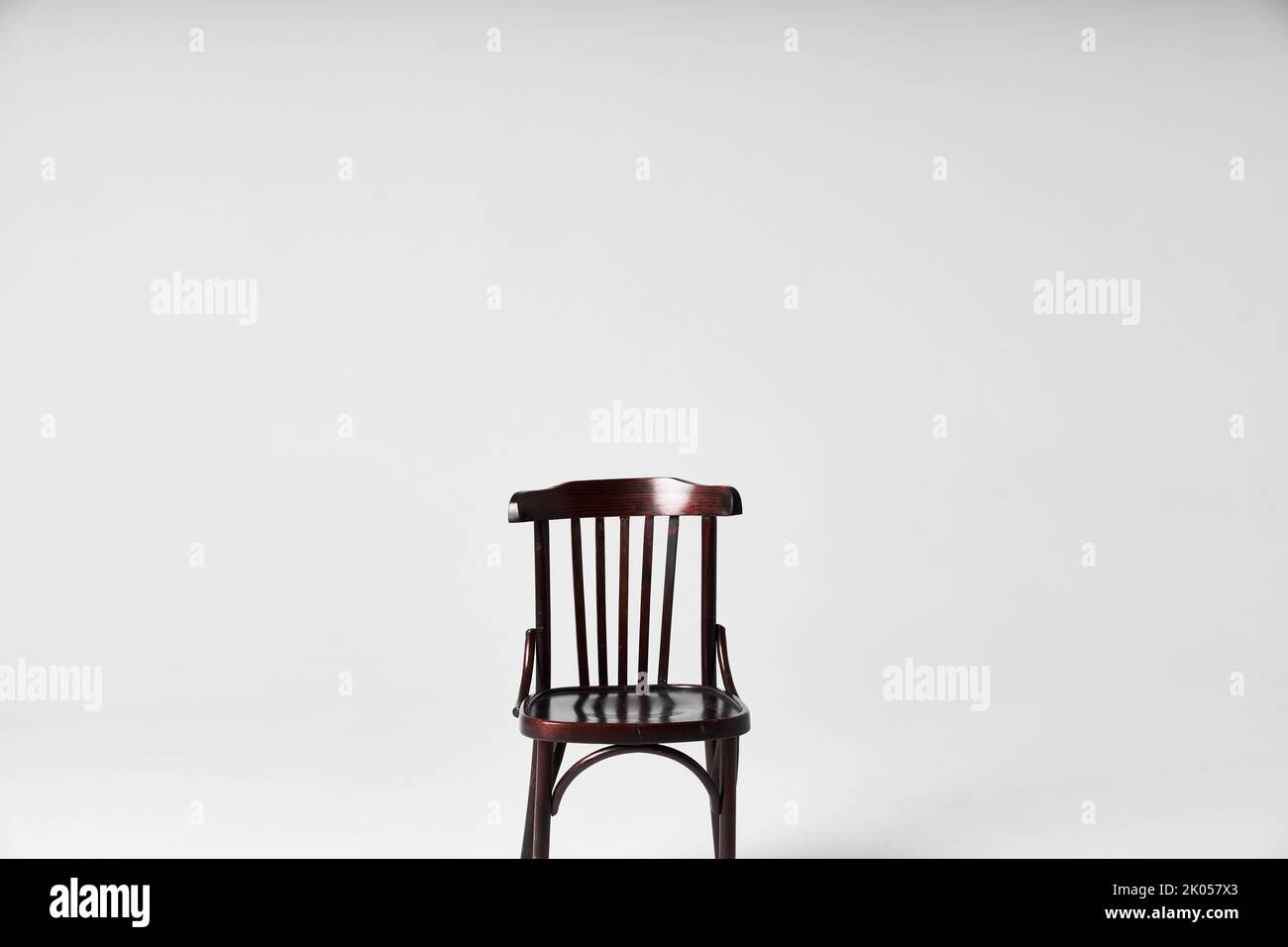 Dark chair on cyclorama under flash light Stock Photo