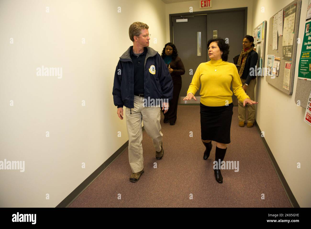 Secretary Shaun Donovan greeting HUD employees and thanking them for
