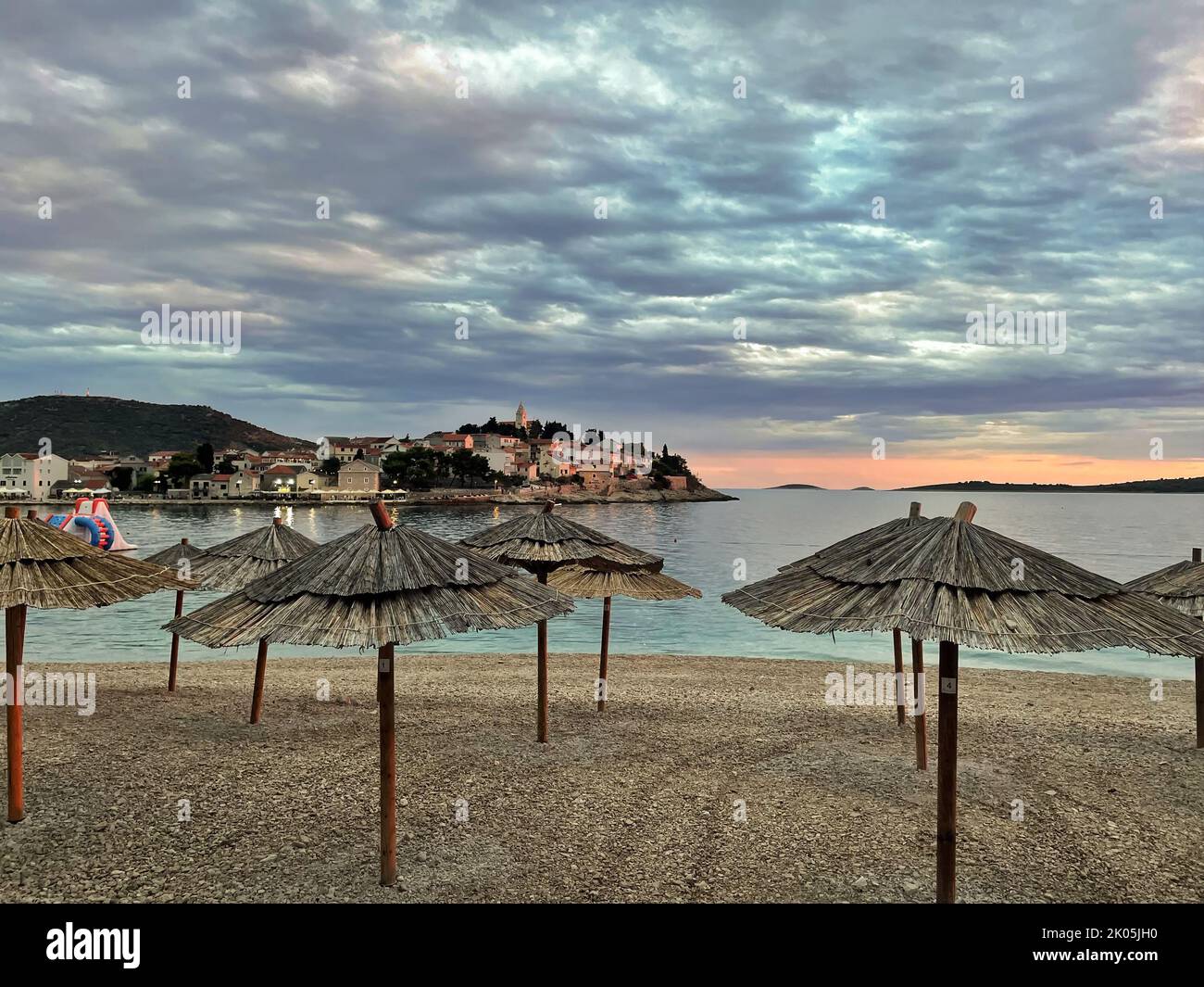 Cityscape of Mediterranean town from the pebble beach Stock Photo