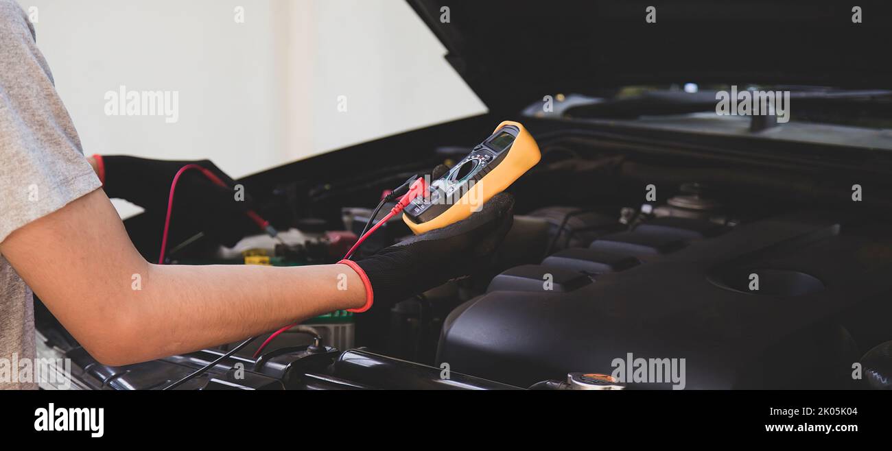 Technicians inspect the car's electrical system Stock Photo Alamy