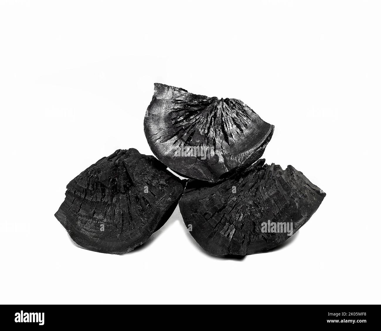 natural charcoal hardwood charcoal on a white background Stock Photo