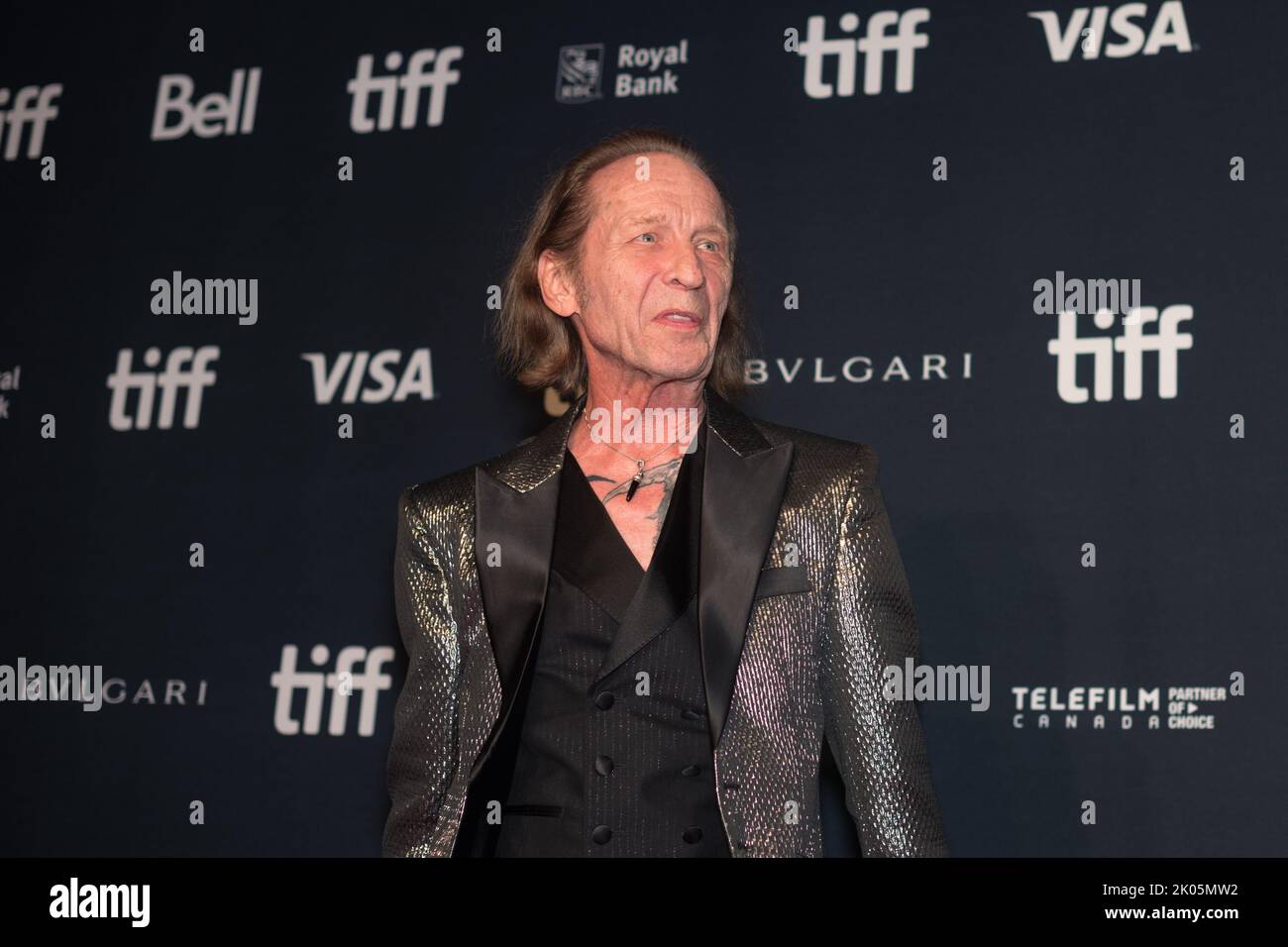 Actor Paul Raci poses for a photograph on the red carpet for the film