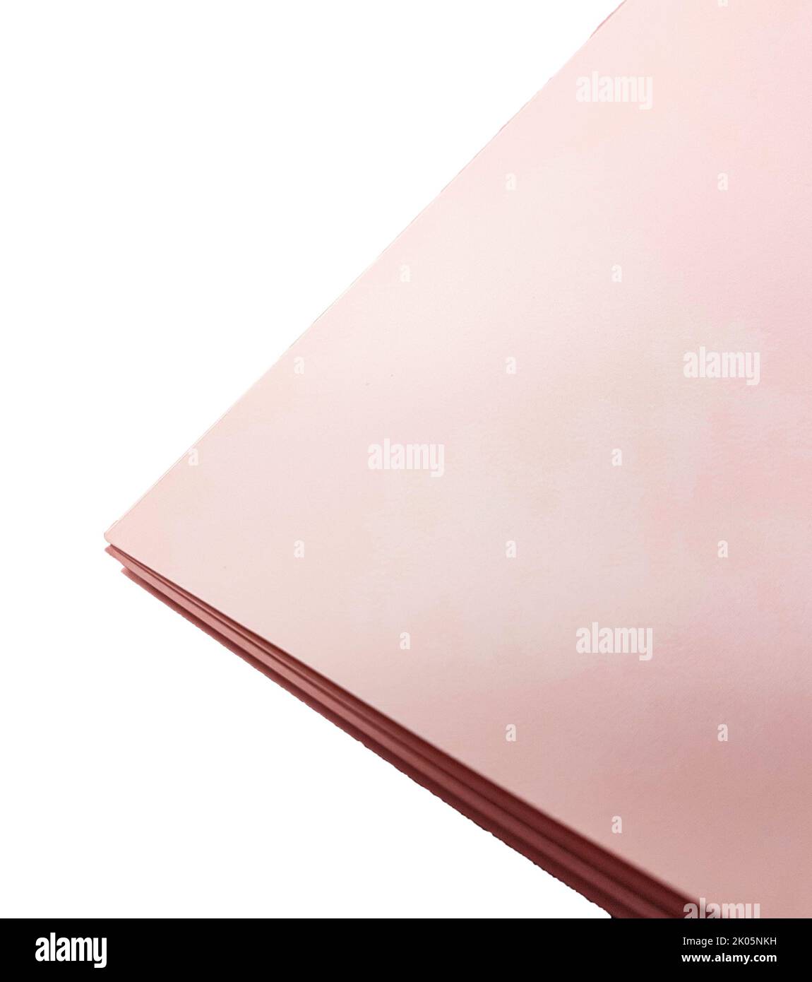 Top view of a stack of pink paper on a white isolated background Stock ...