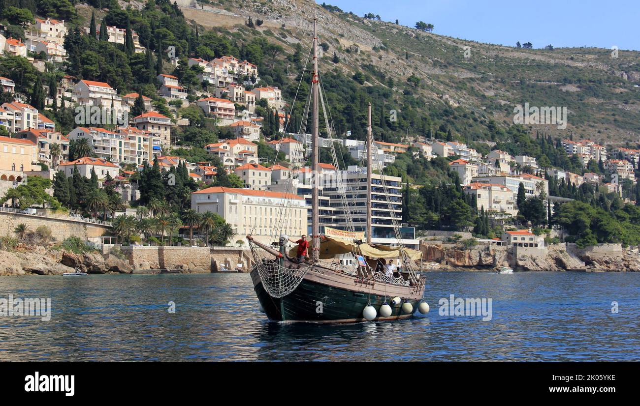 Excursion replica of the old-time fishing boat underway off the Dalmatian Coast, Dubrovnik, Croatia Stock Photo