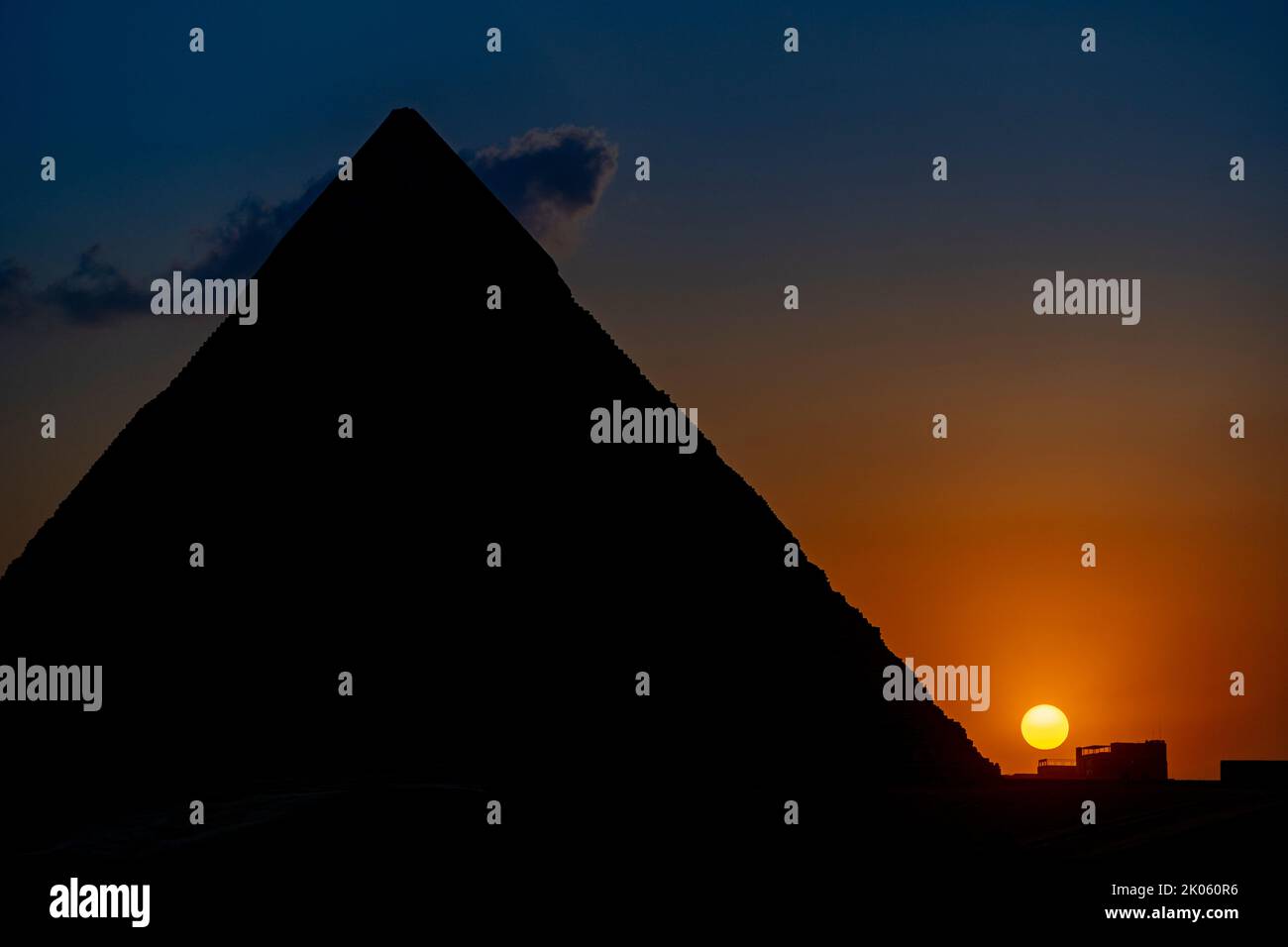 Sunset at the pyramid of Kefren, in the desert of Cairo Stock Photo