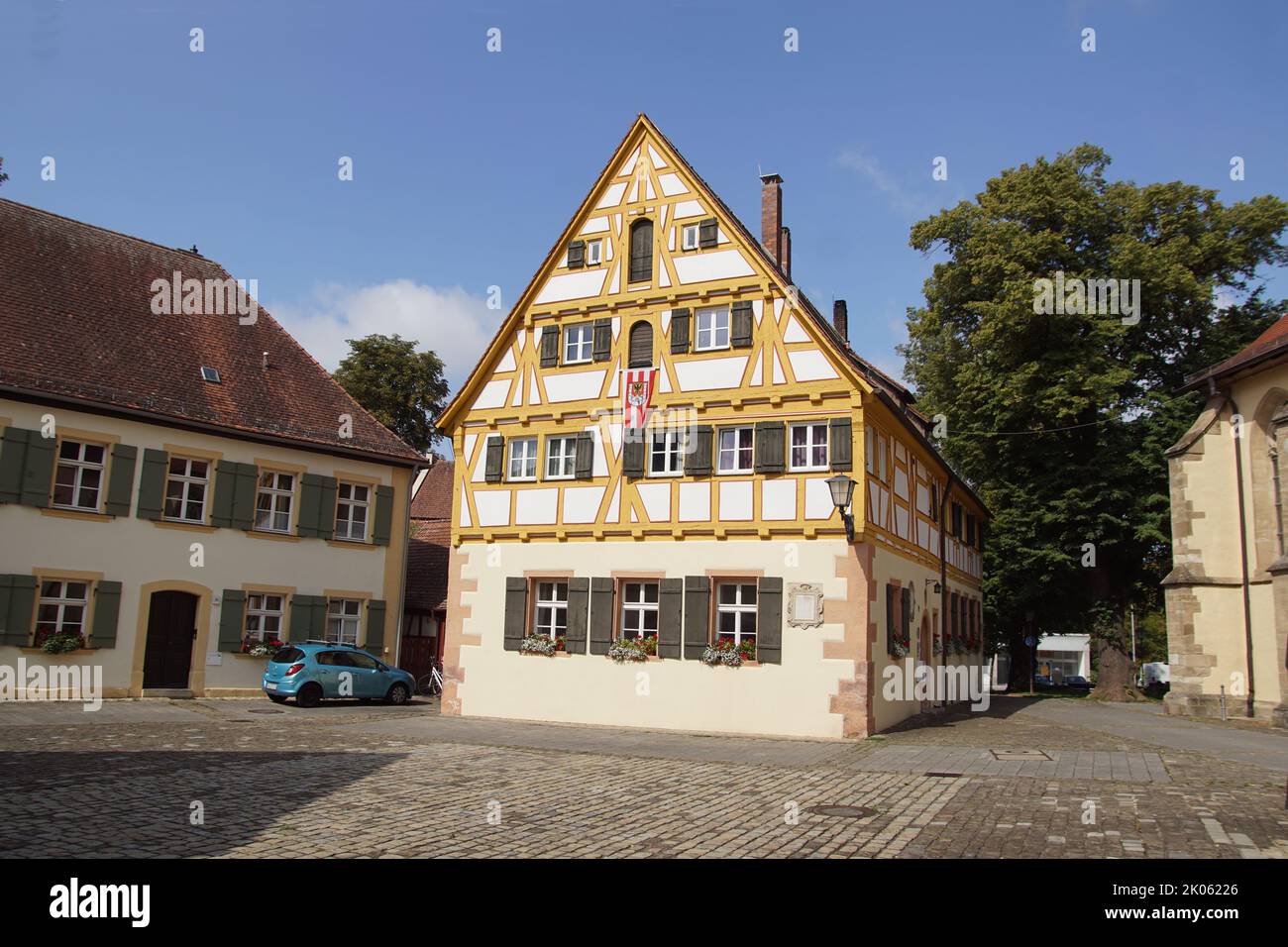 Old Latin School, a half-timbered house, Old Town, Martin Luther Platz iin the German city of Weissenburg, summer. August. Stock Photo