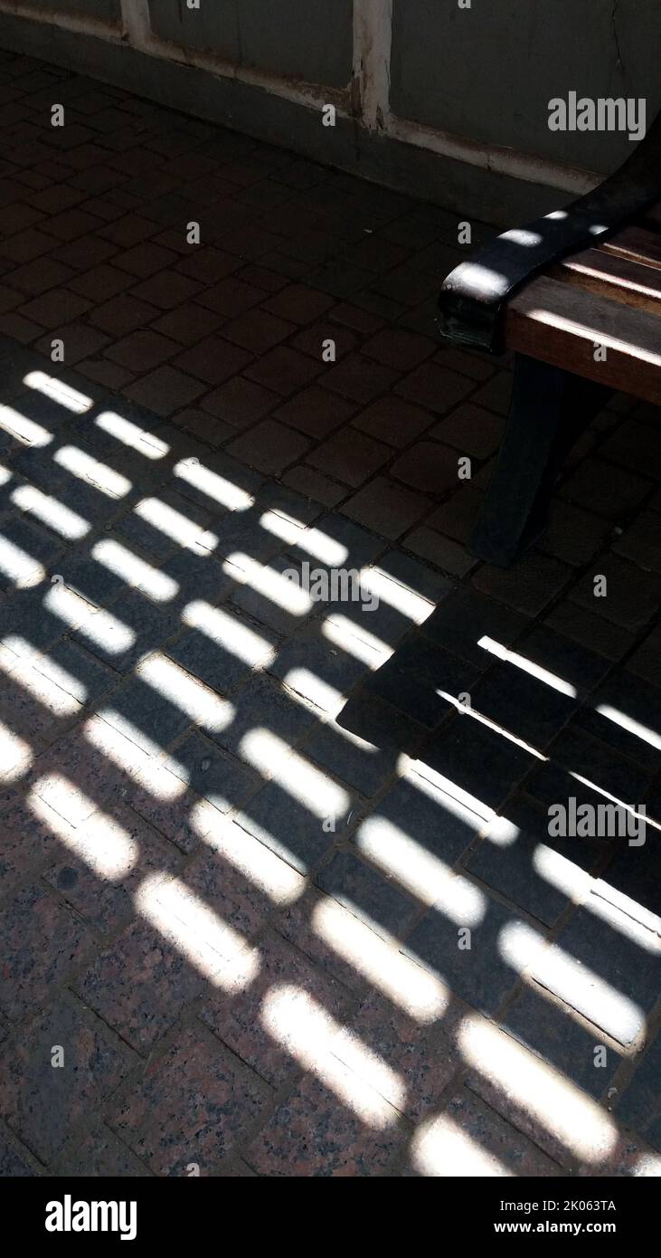 Sun light rays reflect on the ground. Location Souk Mubarakiya. Kuwait old market. Stock Photo