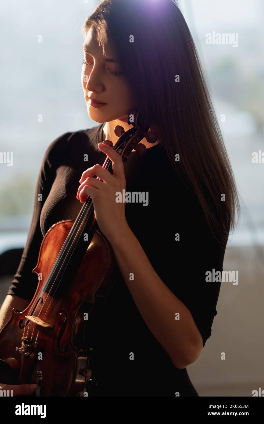 female violinist conceptual portrait inspiration Stock Photo