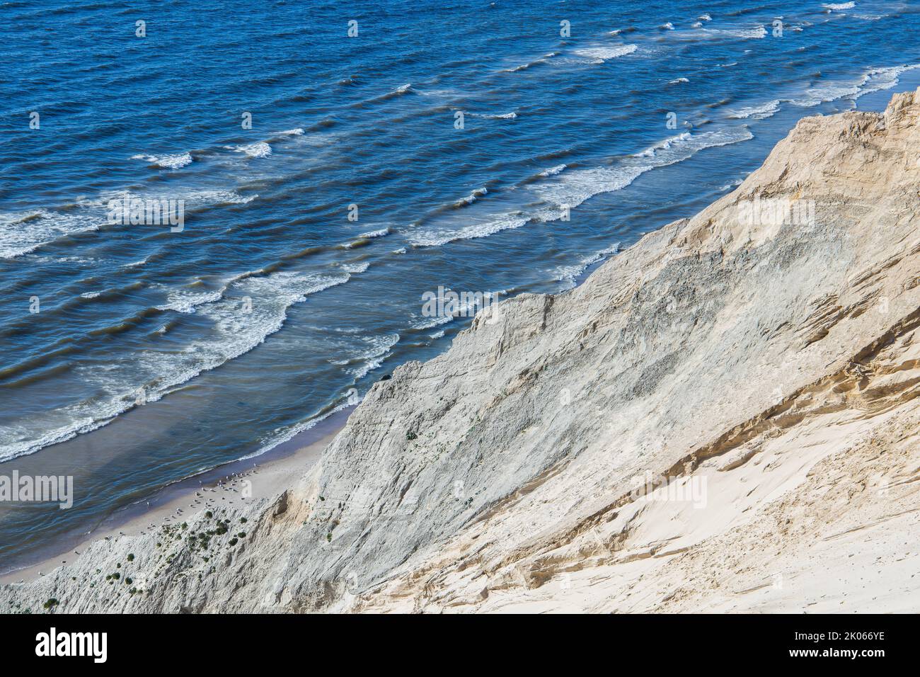 The iconic coast line in Denmark with rocks, sand dunes and the ocean Stock Photo