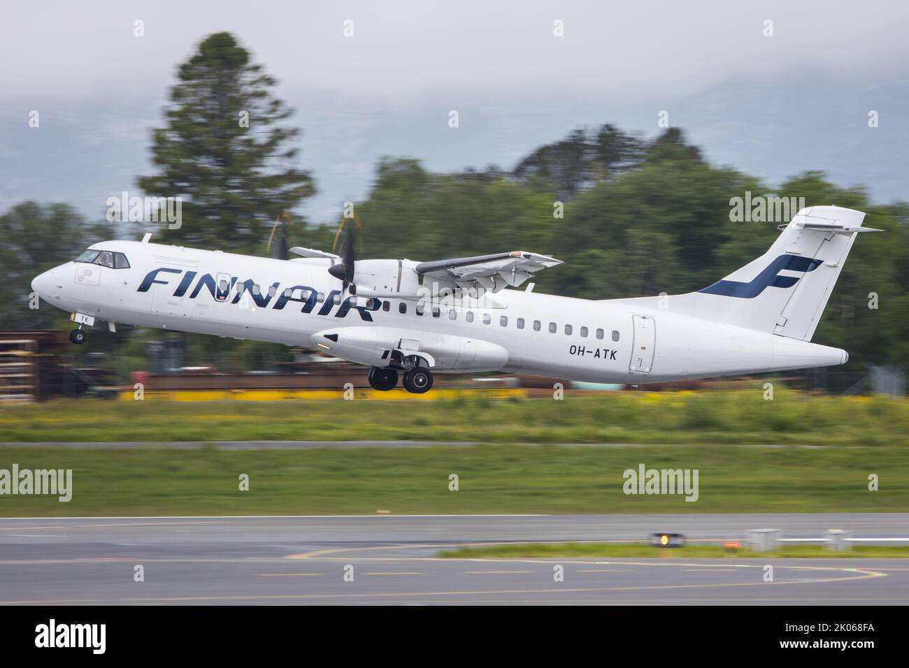 A Finnair ATR-72 departing Bergen Airport in Norway for a flight to Helsinki in Finland Stock Photo