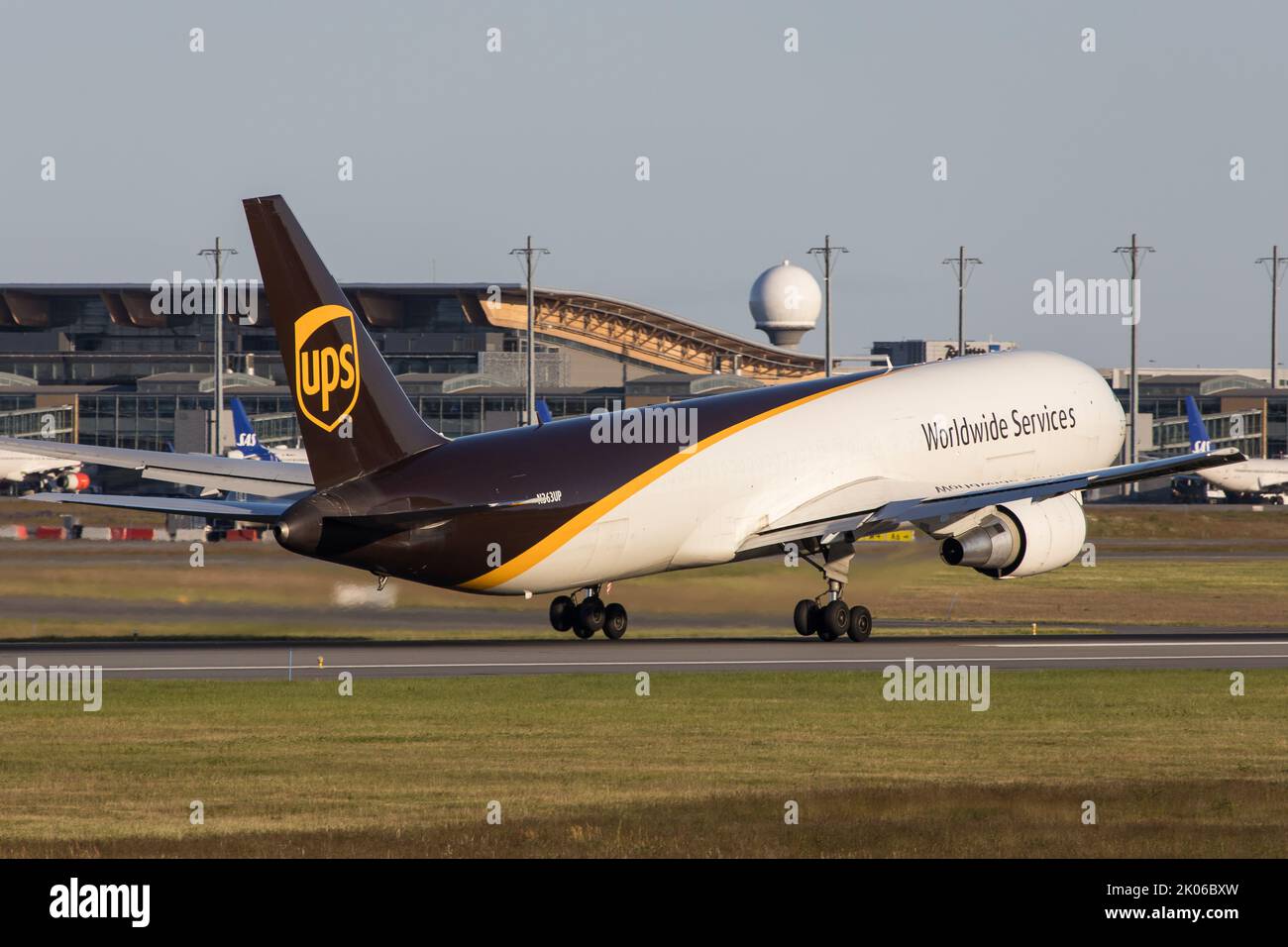 A UPS Boeing 767 cargo aircraft departing Oslo Airport for a logistic flight to Cologne in Germany Stock Photo