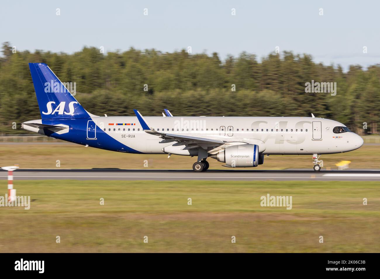 An Airbus A320 of carrier SAS Scandinavian Airlines lining up the runway in Oslo Stock Photo