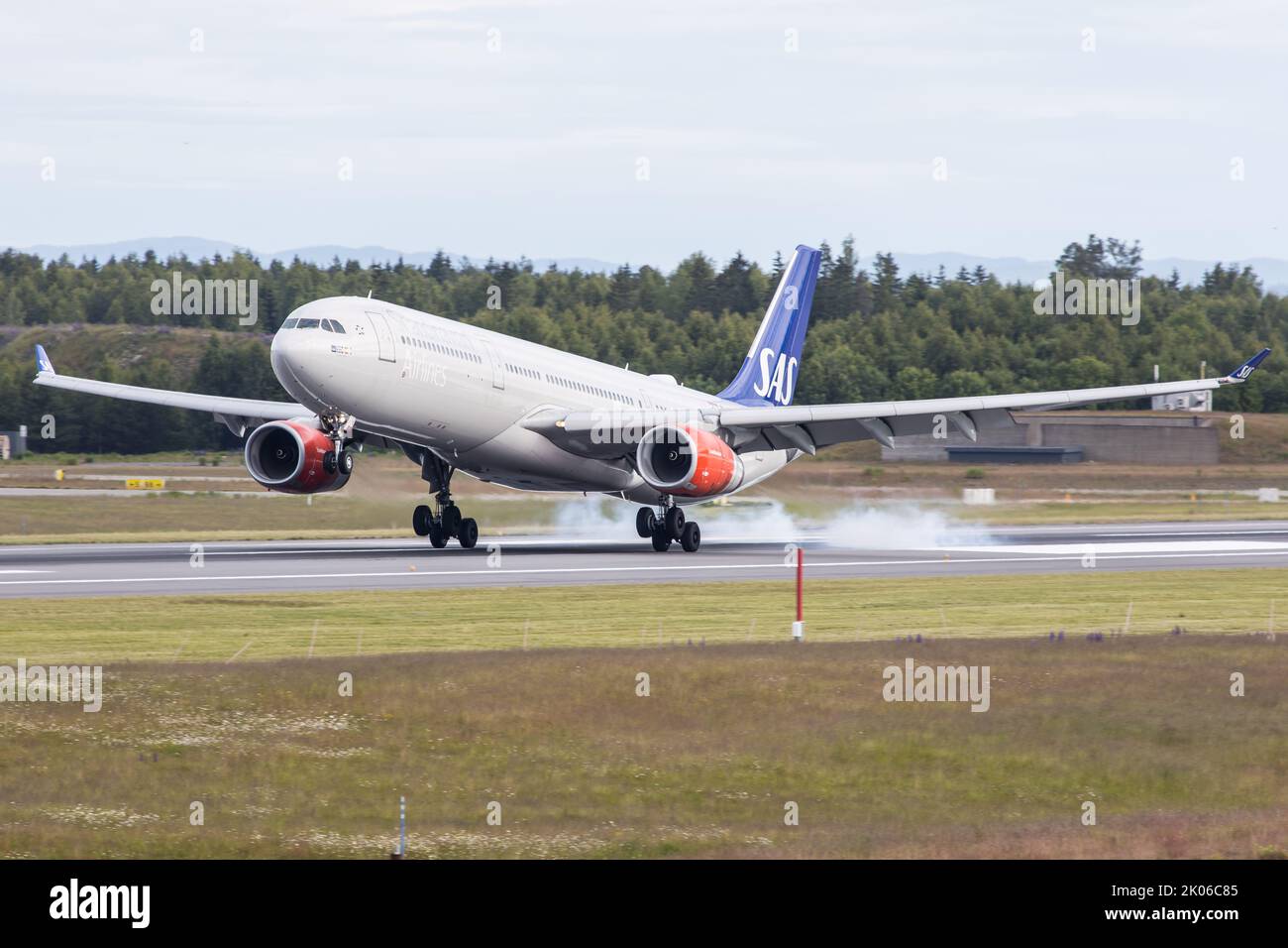 A SAS Scandinavian Airlines Airbus A330-300 arriving at Oslo Airport after a long range flight from the USA Stock Photo