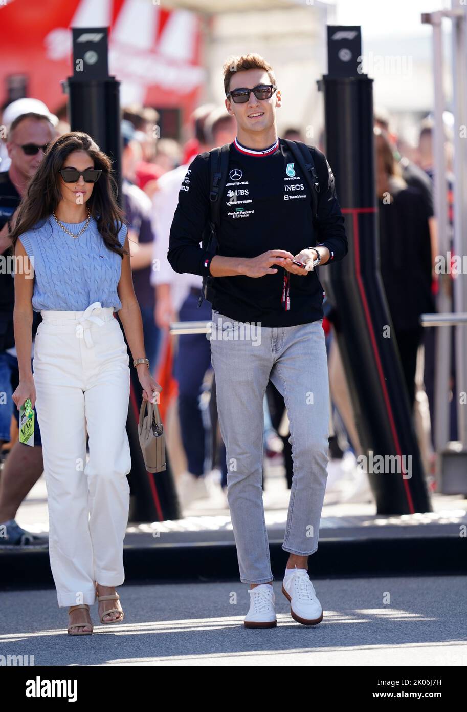Mercedes' George Russell and girlfriend Carmen Montero Mundt arrive for practice at the Monza circuit in Italy. Picture date: Saturday September 10, 2022. Stock Photo