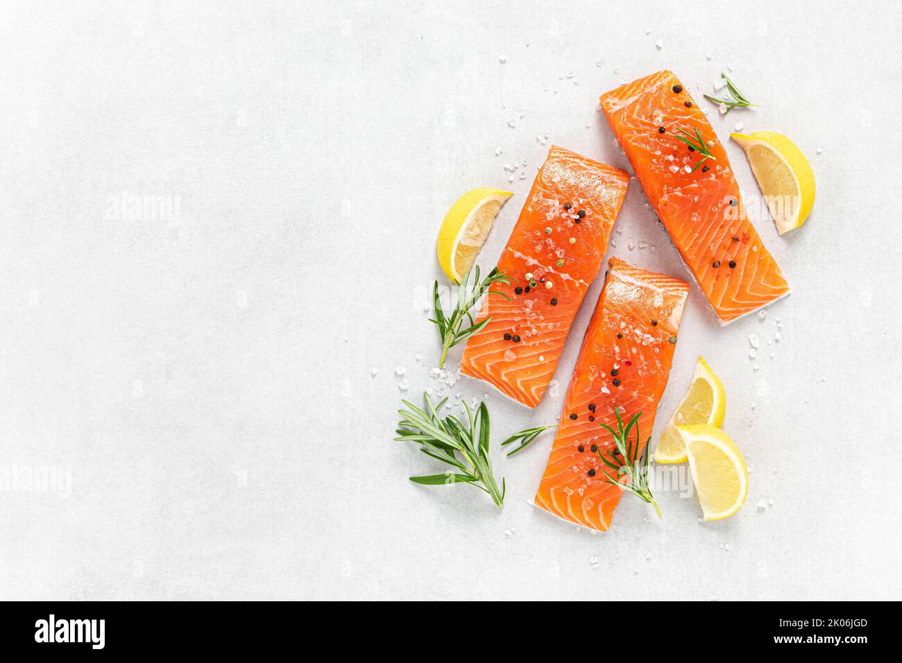 Salmon. Fresh raw salmon fish fillet on white background Stock Photo ...
