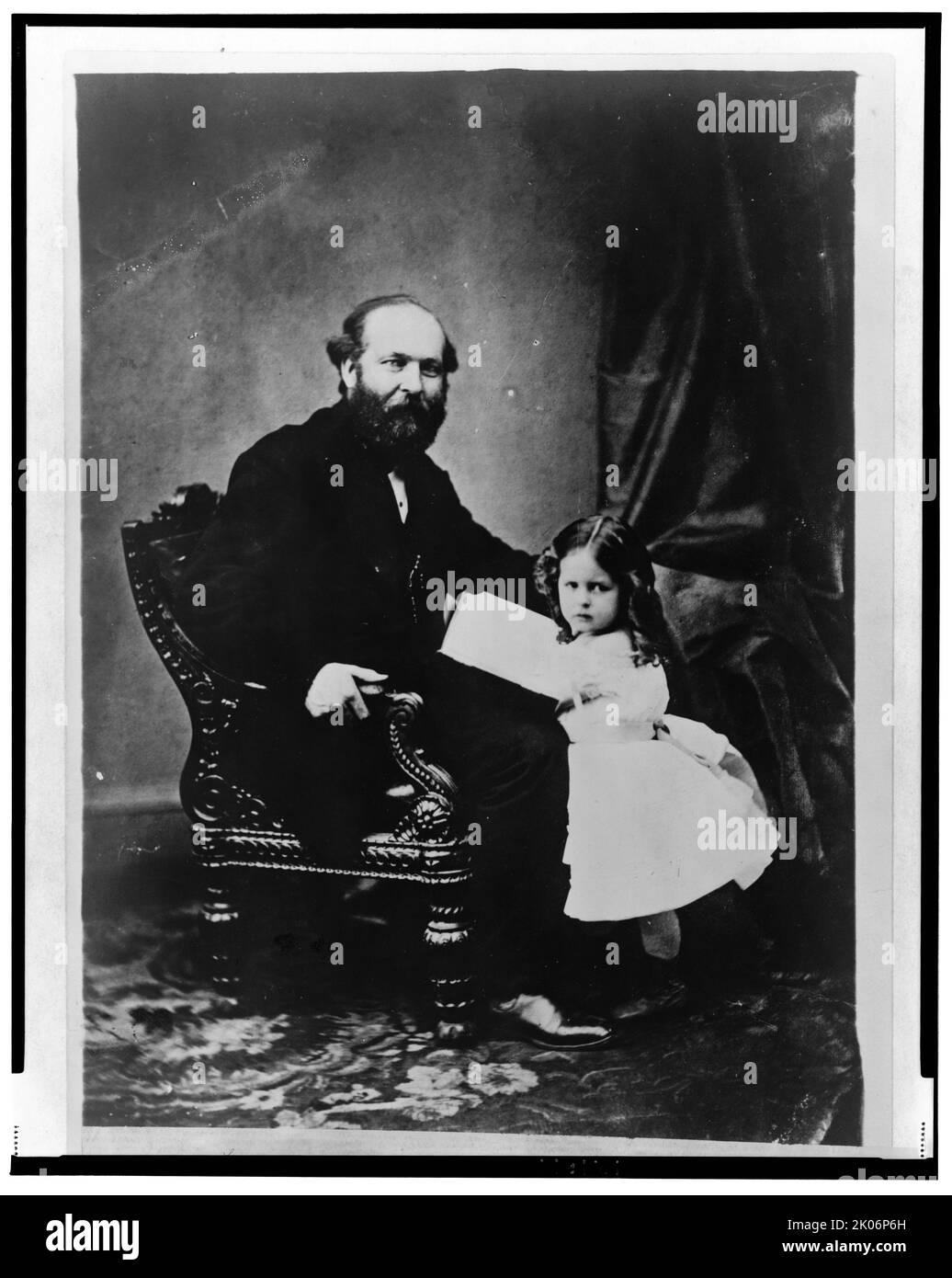 Little Mollie Garfield &amp; her father, c1865, printed later?. James Garfield, portrait, seated, facing right, with daughter Mollie at his knee. Stock Photo