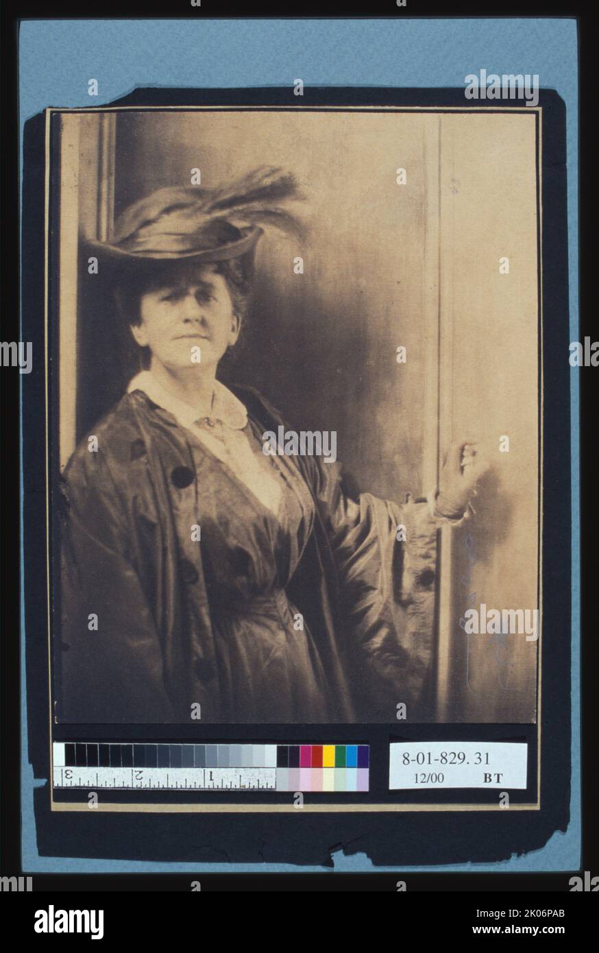 Gertrude Ka&#xa8;sebier, wearing feathered hat, standing, facing front, half-length portrait, c1900. (American photographer K&#xe4;sebier promoted photography as a career for women). Stock Photo