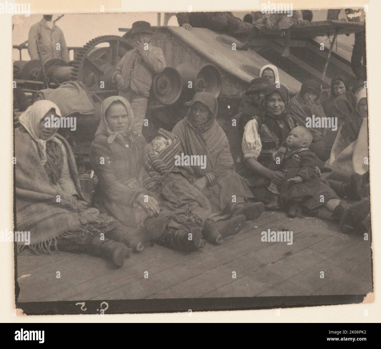 Group of emigrants (women and children) from eastern Europe on deck of
