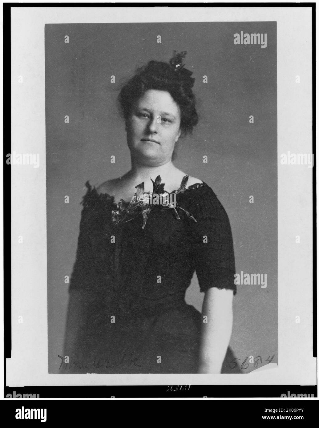Mrs. Crabbe, half-length portrait, standing, facing front, between c1890 and 1910. Stock Photo