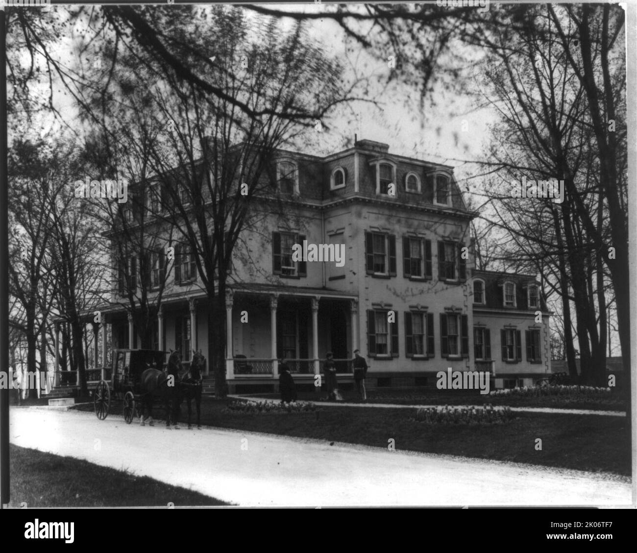Soldiers' Home, exterior showing house, Washington, D.C, c1895. Shows U.S. Soldier's Home at Rock Creek Road and Upshur Street, N.W., with horse-drawn carriage, two women and soldier in uniform in front. Stock Photo