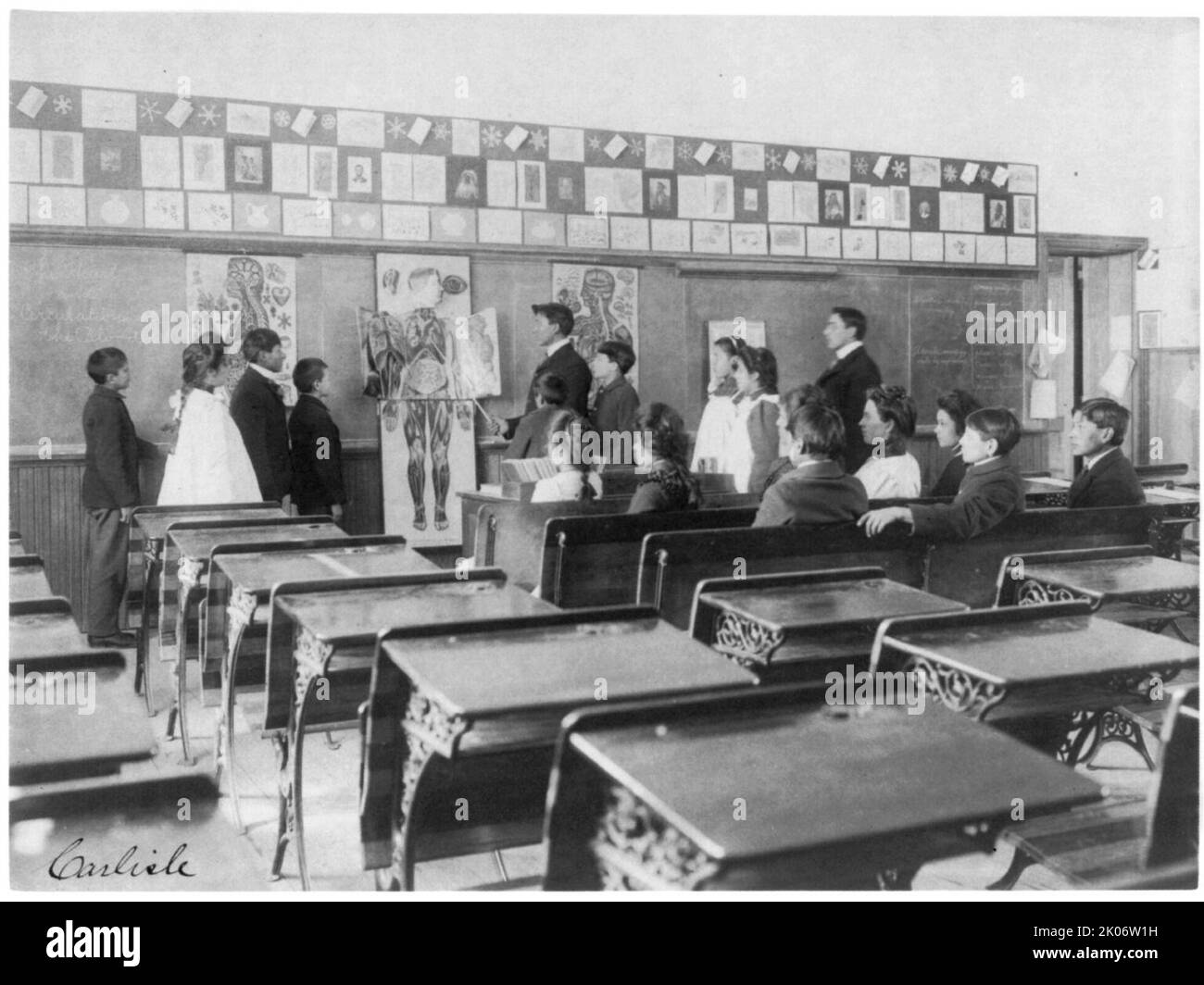United States Indian School, Carlisle, Pa.: Class studying anatomy, 1901. Stock Photo