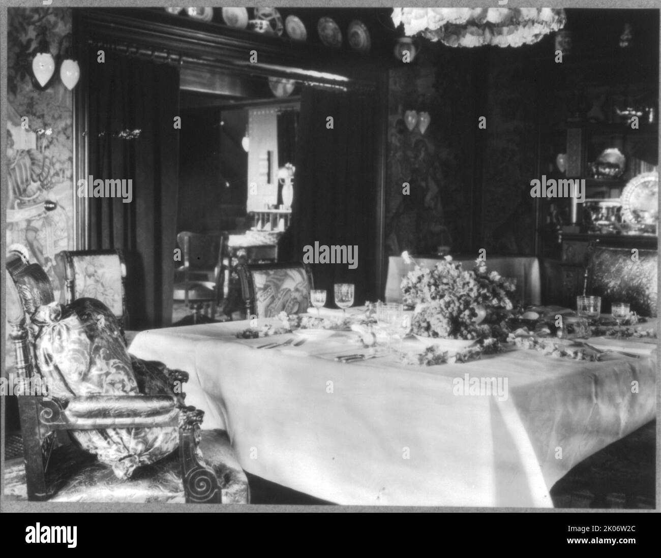 Mrs. Phoebe Apperson Hearst's home, Pleasanton, Cal.: dining room with table setting for four, 1920s. Stock Photo
