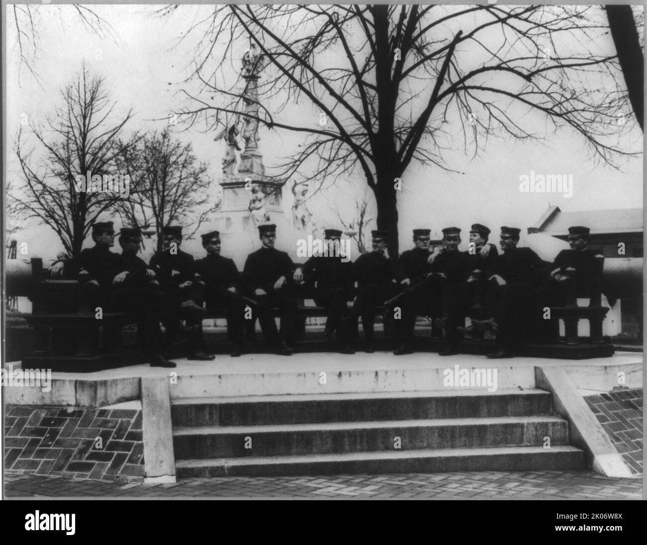 U.S. Naval Academy, Annapolis, 1901. Midshipmen, class of 1902, incl. James O. Richardson, sit on Second Class Bench in semi-circle in front of Tripoli Monument. [James Otto Richardson served as an admiral in the United States Navy from 1902 to 1947]. Stock Photo