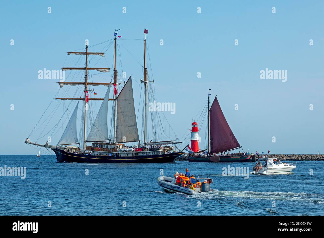 sailing ships, lighthouse, River Warnow, Hanse Sail, Warnemünde, Rostock, Mecklenburg-West Pomerania, Germany Stock Photo