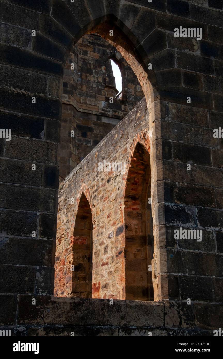 Port Arthur Australia, view through window to wall with arches Stock