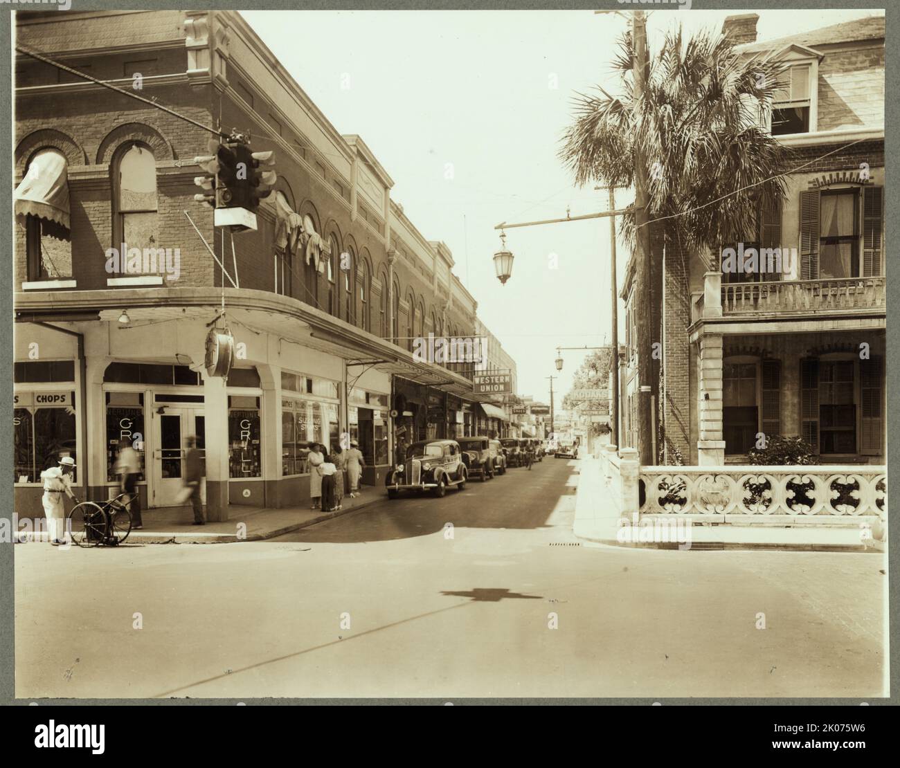 St. George Street, St. Augustine, St. Johns County, Florida, 1937. [Neptune Grill on the corner, Western Union office further down the street]. Stock Photo