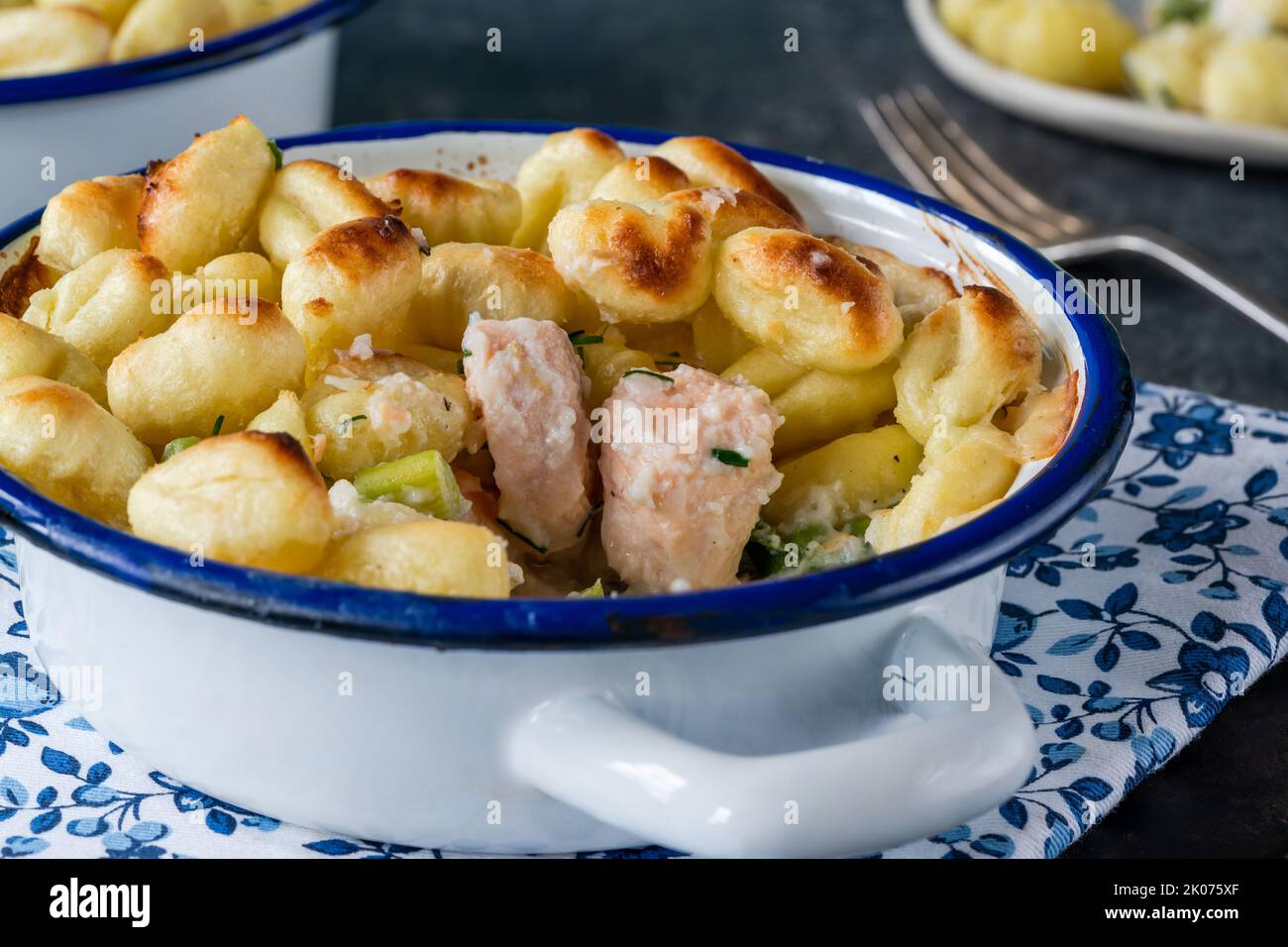 Fish Pie With Baked Potato Gnocchi Topping Stock Photo Alamy