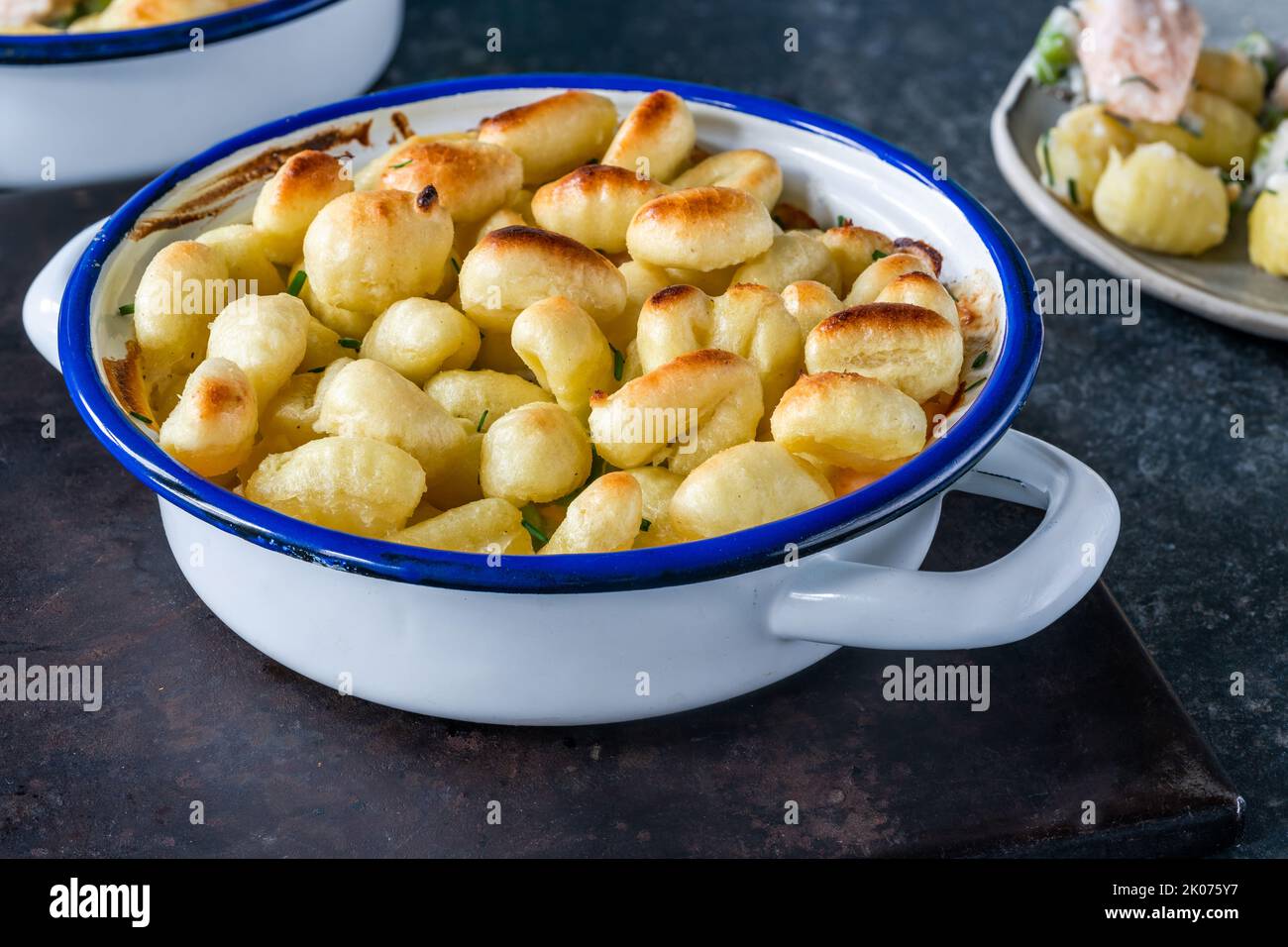 Fish Pie With Baked Potato Gnocchi Topping Stock Photo Alamy