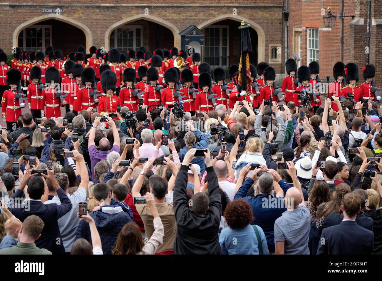 Members of the public gather at the Accession Council ceremony at St James's Palace, London, where King Charles III is formally proclaimed monarch. Charles automatically became King on the death of his mother, but the Accession Council, attended by Privy Councillors, confirms his role. Picture date: Saturday September 10, 2022. Stock Photo