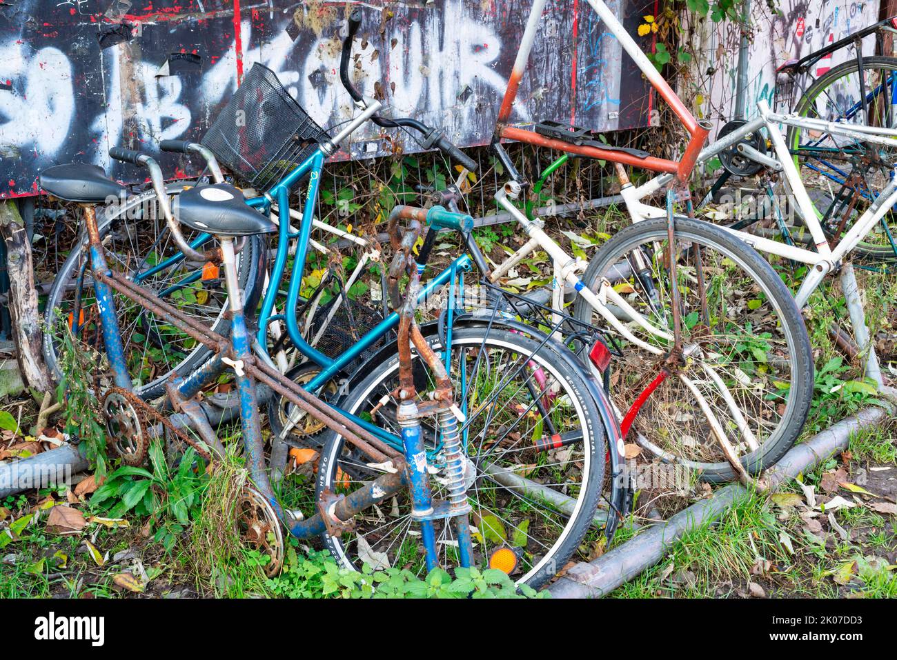 Junkyard, damaged bicycles in public space, Cologne, North Rhine